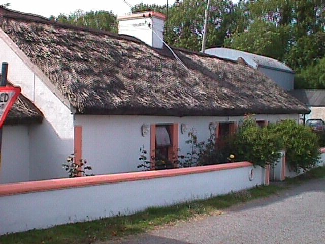 Con Griffins thatched house at the Lower Cross, the cabin with the roses 'round the door